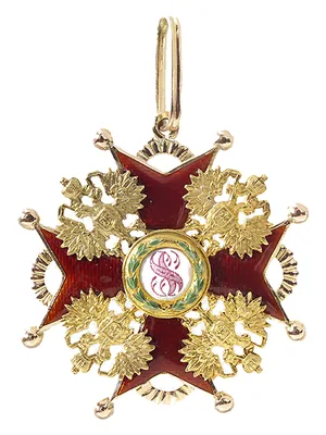 Знак ордена Святого Станислава — золотой крест с раздвоенными концами